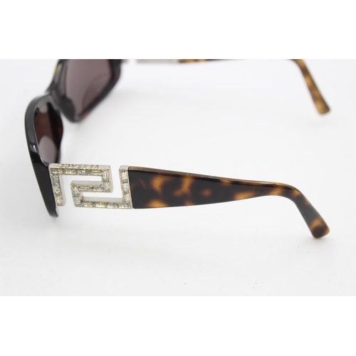 228 - A pair of cased Versace tortoiseshell rectangular framed ladies sunglasses