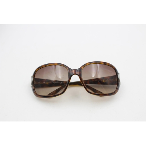 231 - A pair of Gucci brown framed oversize ladies sunglasses with original case