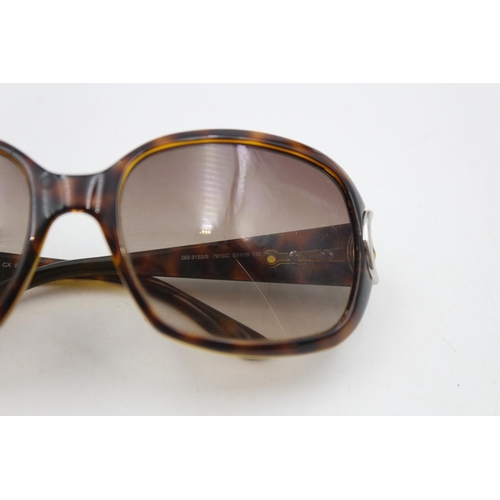 231 - A pair of Gucci brown framed oversize ladies sunglasses with original case