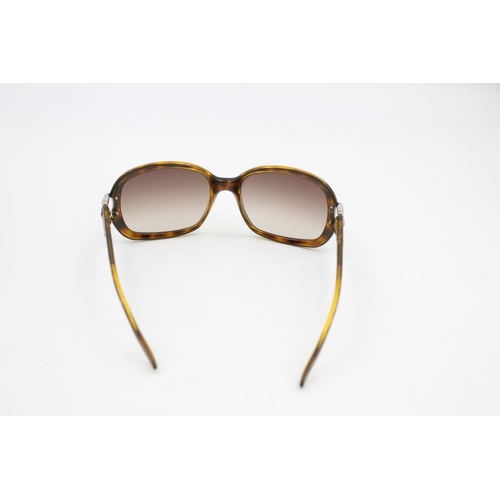 231 - A pair of Gucci brown framed oversize ladies sunglasses with original case