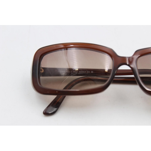 232 - A pair of Chanel brown framed rectangular statement ladies sunglasses