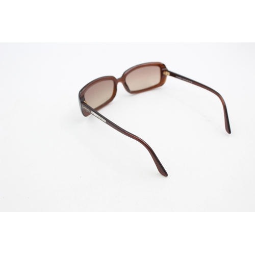 232 - A pair of Chanel brown framed rectangular statement ladies sunglasses