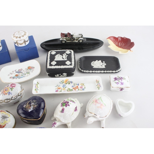 252 - A collection of assorted ceramic trinket boxes and dishes to include Wedgwood black Jasperware, Dres... 