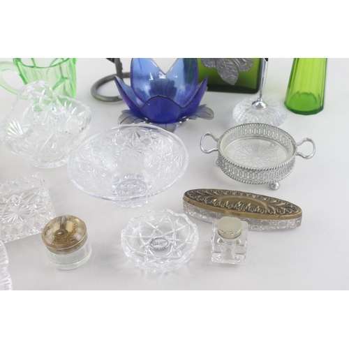 254 - A collection of assorted vintage glassware to include two green glass jugs, cut crystal basket,  Roy... 