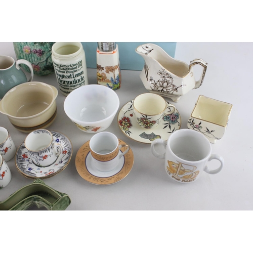 256 - A large collection of assorted china to include Belleek jug, Royal Doulton jug, Wade trinket dish et... 