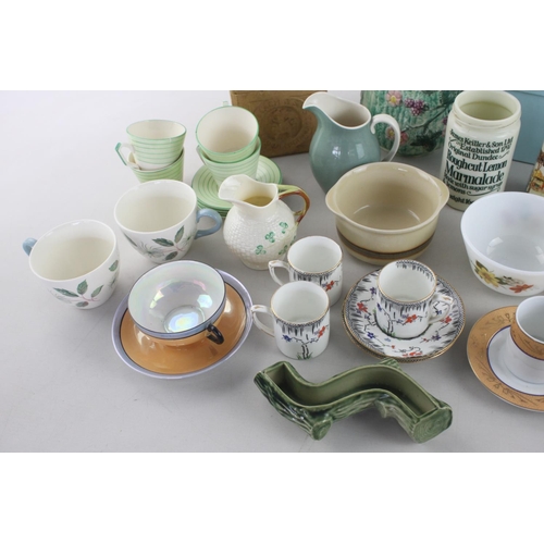 256 - A large collection of assorted china to include Belleek jug, Royal Doulton jug, Wade trinket dish et... 