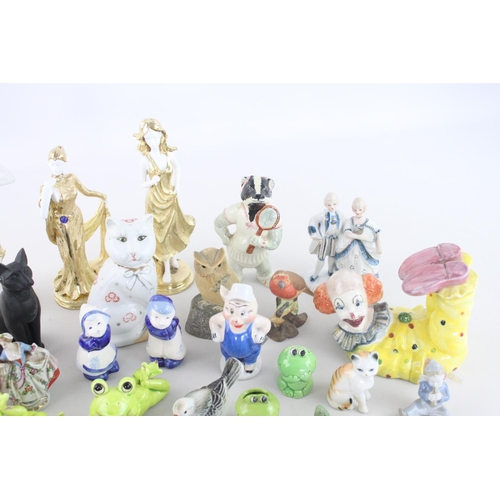 266 - A large collection of assorted ceramic figurines