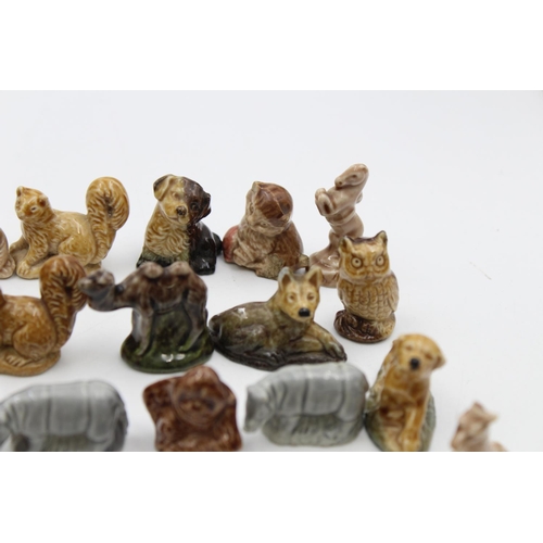 269 - A large collection of Wade Whimsies animal figurines