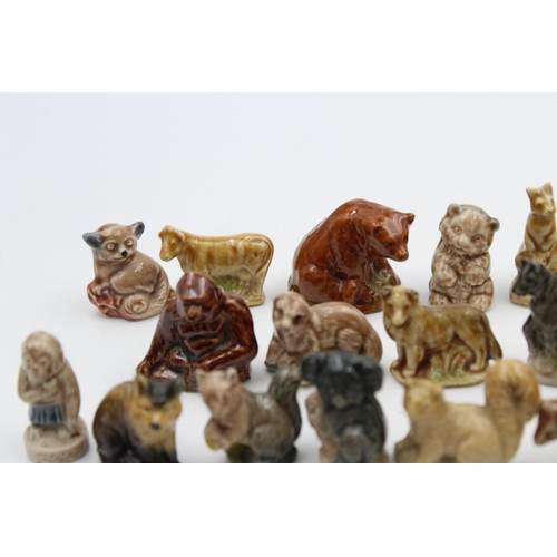 269 - A large collection of Wade Whimsies animal figurines