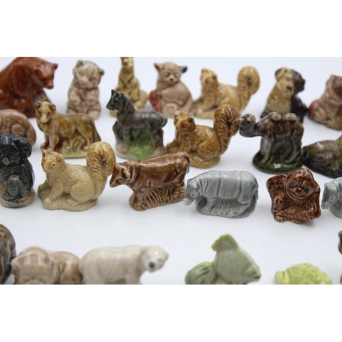 269 - A large collection of Wade Whimsies animal figurines