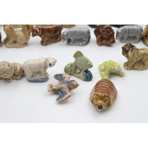 269 - A large collection of Wade Whimsies animal figurines