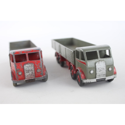 318 - Two vintage Dinky grey and red Foden 8 wheel diecast model trucks