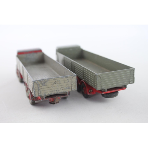 318 - Two vintage Dinky grey and red Foden 8 wheel diecast model trucks