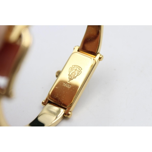 75 - A Gucci 1500 gold tone quartz ladies wristwatch with original box