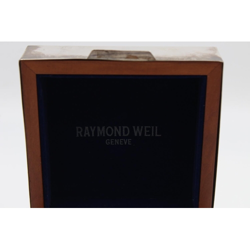 88 - A vintage Raymond Weil gold tone hand wind gents wristwatch with hallmarked .925 silver lidded teak ... 