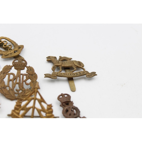 97 - Fifteen assorted vintage military cap badges to include Scottish, S.A.S, Royal West Kent etc.