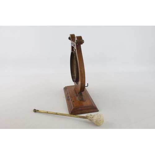 356 - An early 20th century lyre oak and brass ceremonial dinner gong with striker - approx. 30cm high