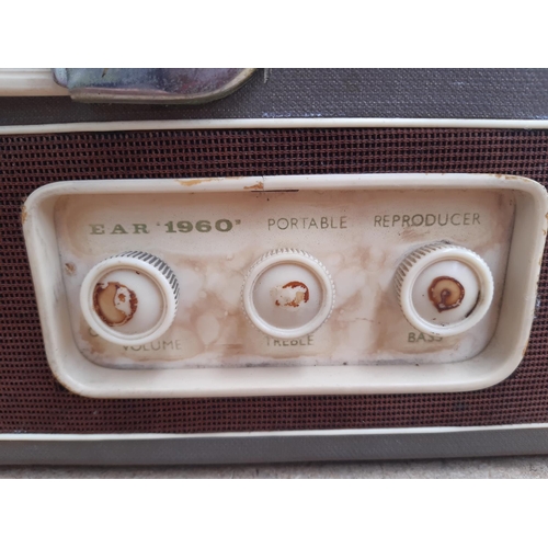 1114 - A late 1950s/early 1960s Electric Audio Reproducers (EAR) 1960 portable four speed auto changer reco... 