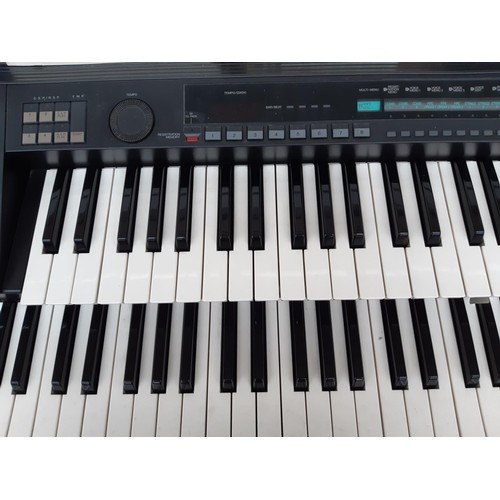 1128 - A late 1980s Yamaha Electone HS-6 electronic organ with user's guide