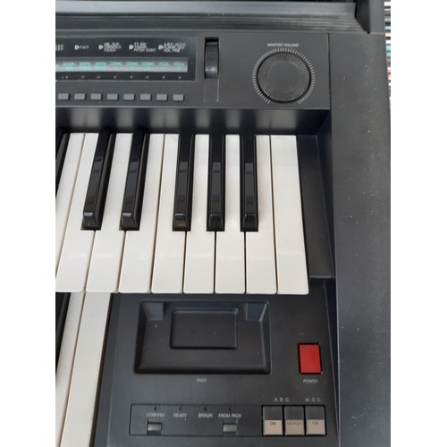 1128 - A late 1980s Yamaha Electone HS-6 electronic organ with user's guide