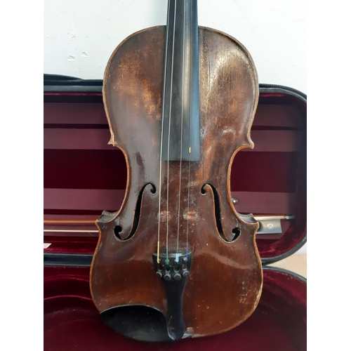 1121 - A cased vintage full size violin with bow, fine tuner tailpiece, rosin and spare strings (bridge abs... 