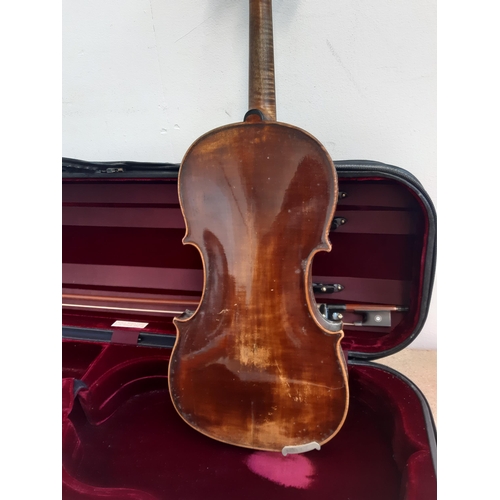 1121 - A cased vintage full size violin with bow, fine tuner tailpiece, rosin and spare strings (bridge abs... 