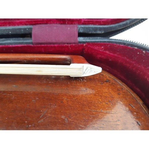 1121 - A cased vintage full size violin with bow, fine tuner tailpiece, rosin and spare strings (bridge abs... 