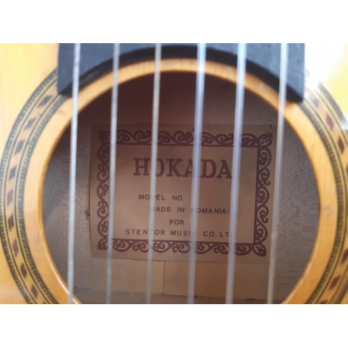 1124 - A cased Hokada ¾ size nylon strung classical guitar