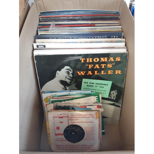 1141 - Four boxes and a rack containing a large quantity of LP and 7