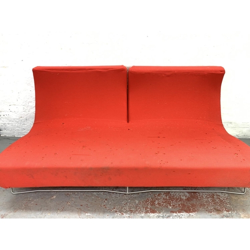 1035 - A Ligne Roset red upholstered sofa designed by Pascal Mourgue in 2004 - approx. 198cm wide x 89cm de... 