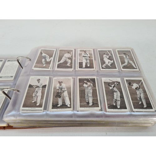 336A - A large collection of vintage cigarette cards to include Players, Gallaher, Sarony, Cope's etc.