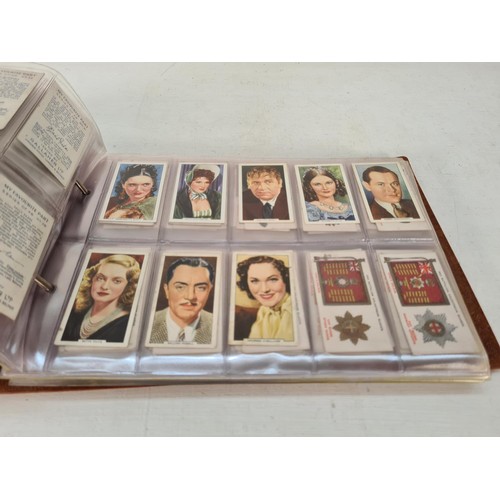 336A - A large collection of vintage cigarette cards to include Players, Gallaher, Sarony, Cope's etc.