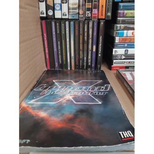 1169 - A box containing PC CD and DVD ROM discs to include Beyond the Frontier, The Sims Deluxe Edition, Si... 