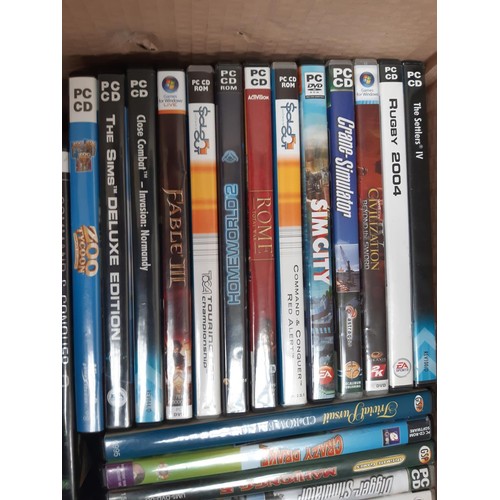 1169 - A box containing PC CD and DVD ROM discs to include Beyond the Frontier, The Sims Deluxe Edition, Si... 