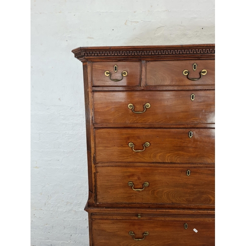 1001 - A George III mahogany chest on chest with three short drawers, six long drawers, brushing slide, bra... 