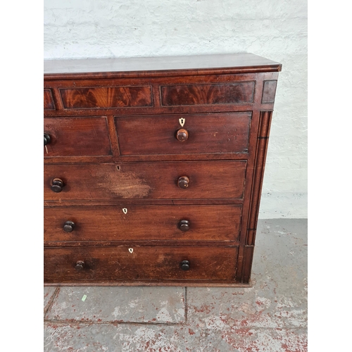 1002 - A large Victorian mahogany chest of two short over three long drawers with three further hidden draw... 