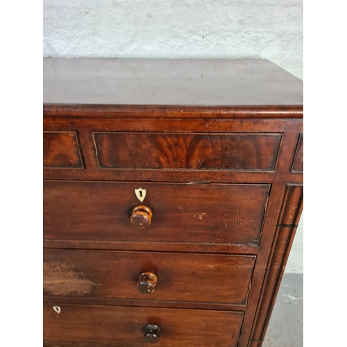 1002 - A large Victorian mahogany chest of two short over three long drawers with three further hidden draw... 