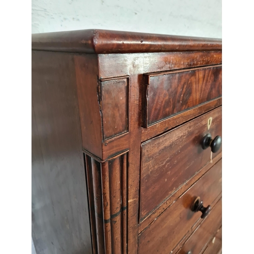 1002 - A large Victorian mahogany chest of two short over three long drawers with three further hidden draw... 