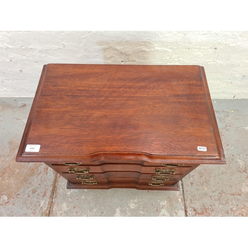 1005 - A Georgian style mahogany miniature chest of four drawers - approx. 64cm high x 59cm wide x 37cm dee... 