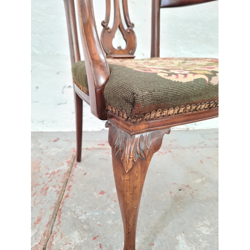 1006 - A 19th century mahogany carver dining chair with tapestry seat, carved fretwork back and ball and cl... 