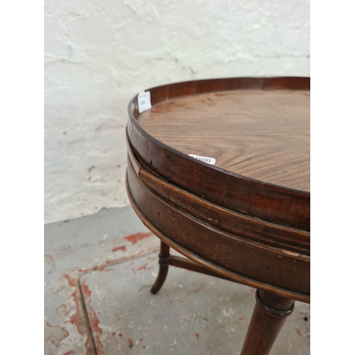 1008 - An Edwardian mahogany oval side table - approx. 48cm high x 45cm wide x 61cm long