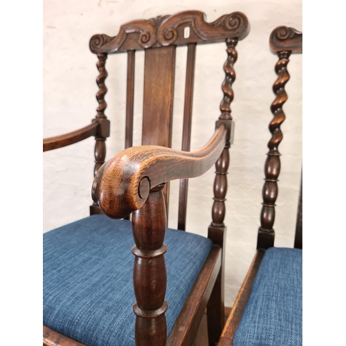 1025 - A 1920s/30s Denby & Spinks of Leeds oak draw leaf dining table with X frame stretcher and four oak b... 