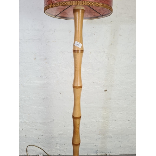 1031 - A mid 20th century teak bamboo effect standard lamp with shade - approx. 169cm high