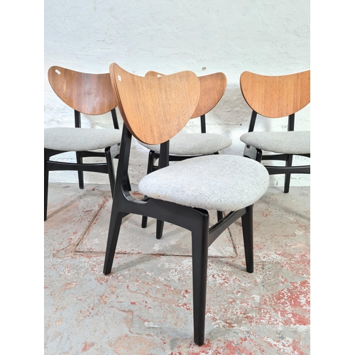 1041 - A set of four G Plan E Gomme Librenza tola wood dining chairs with grey upholstery and ebonised supp... 