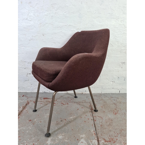 1046 - A mid 20th century brown upholstered tub chair on chrome supports