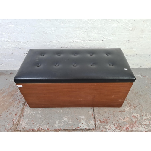 1049 - A mid 20th century teak blanket box with black leatherette upholstered lid - approx. 46cm high x 95c... 