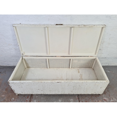 1050 - A 1930s Lloyd Loom style white painted wicker blanket box/ottoman - approx. 40cm high x 132cm wide x... 