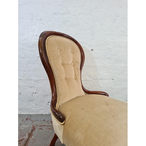 1052 - A Victorian mahogany and beige upholstered spoon back nursing/bedroom chair - approx. 94cm high x 55... 