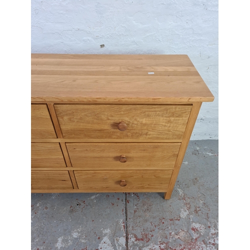 1056 - A modern oak chest of six drawers - approx. 79cm high x 120cm wide x 40cm deep