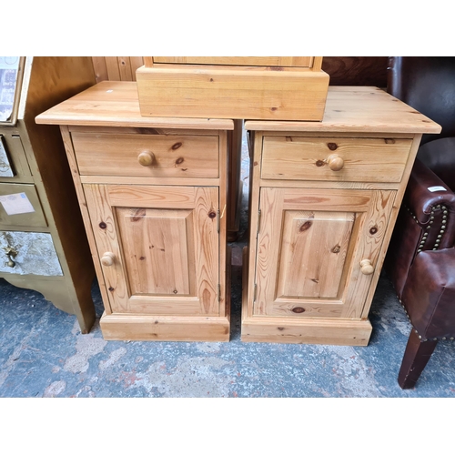 1058 - Three modern solid pine bedside cabinets, two matching